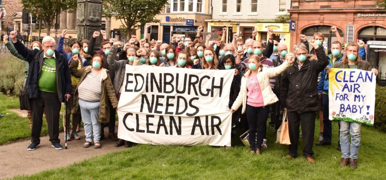 Group of protestors with banner reading "Edinburgh needs Clean Air"