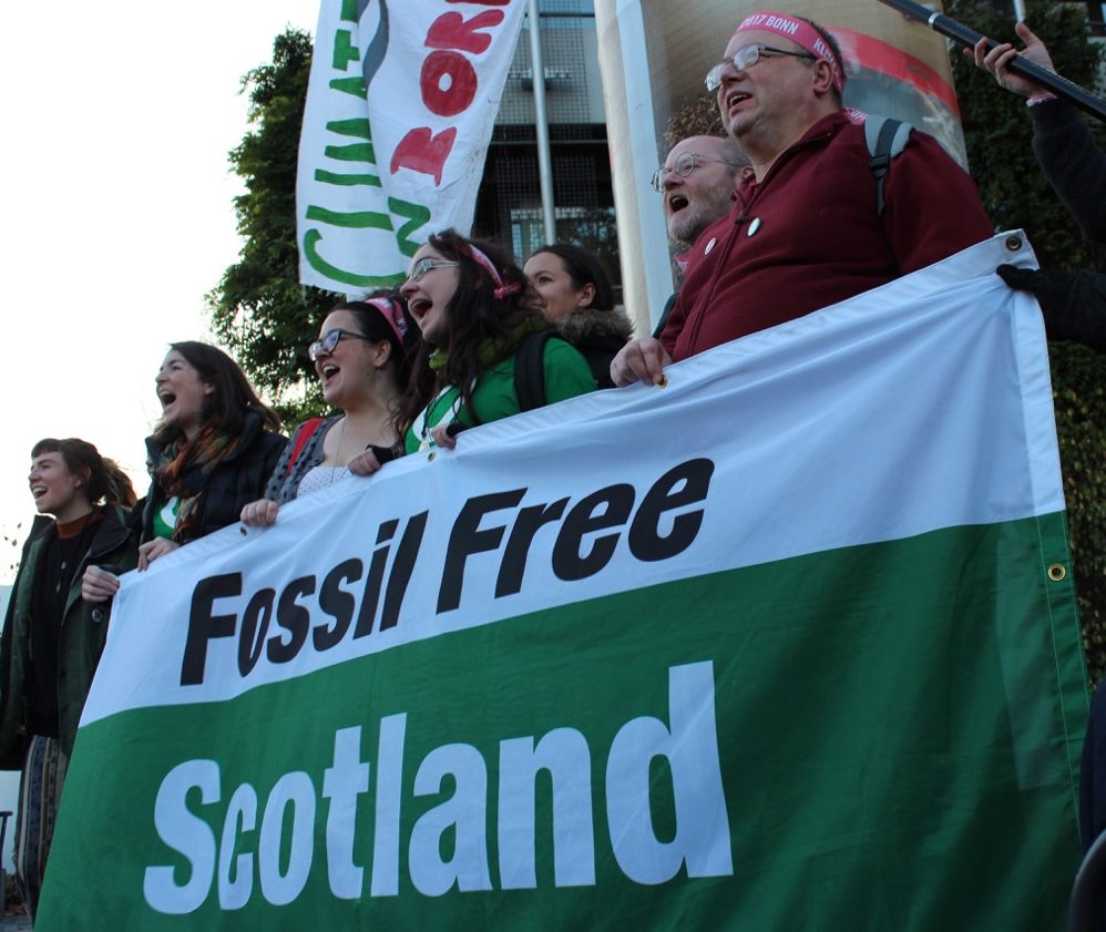 Protestors with Fossil Free Scotland banner