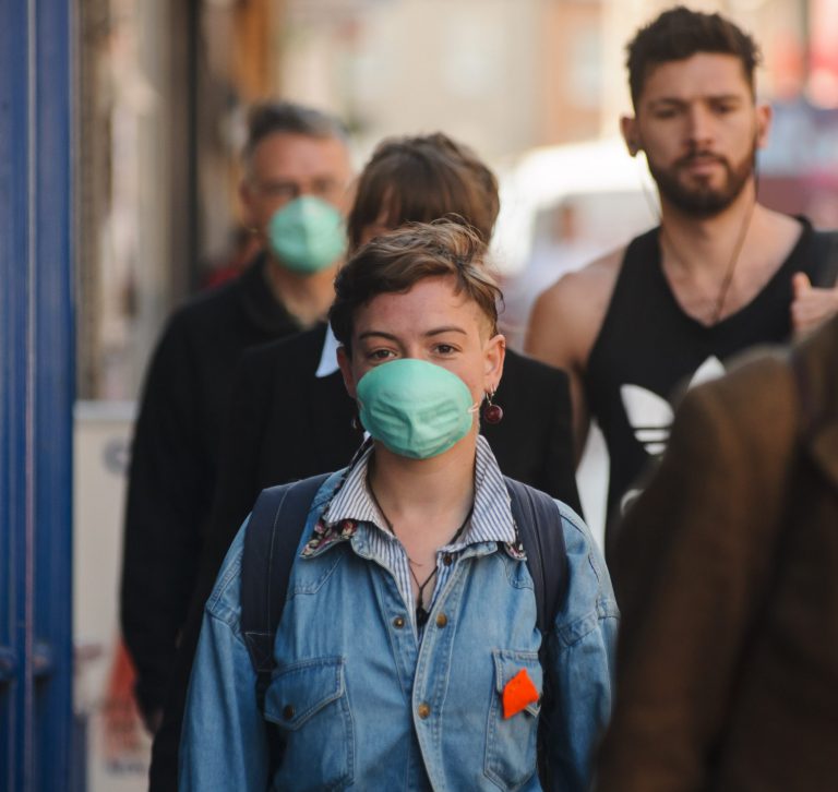 Person with air pollution mask in Edinburgh