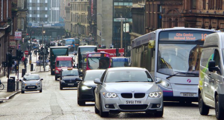 Glasgow's Hope Street with cars, taxis and buses.