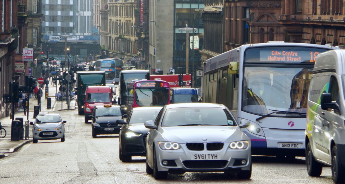 Glasgow's Hope Street with cars, taxis and buses.