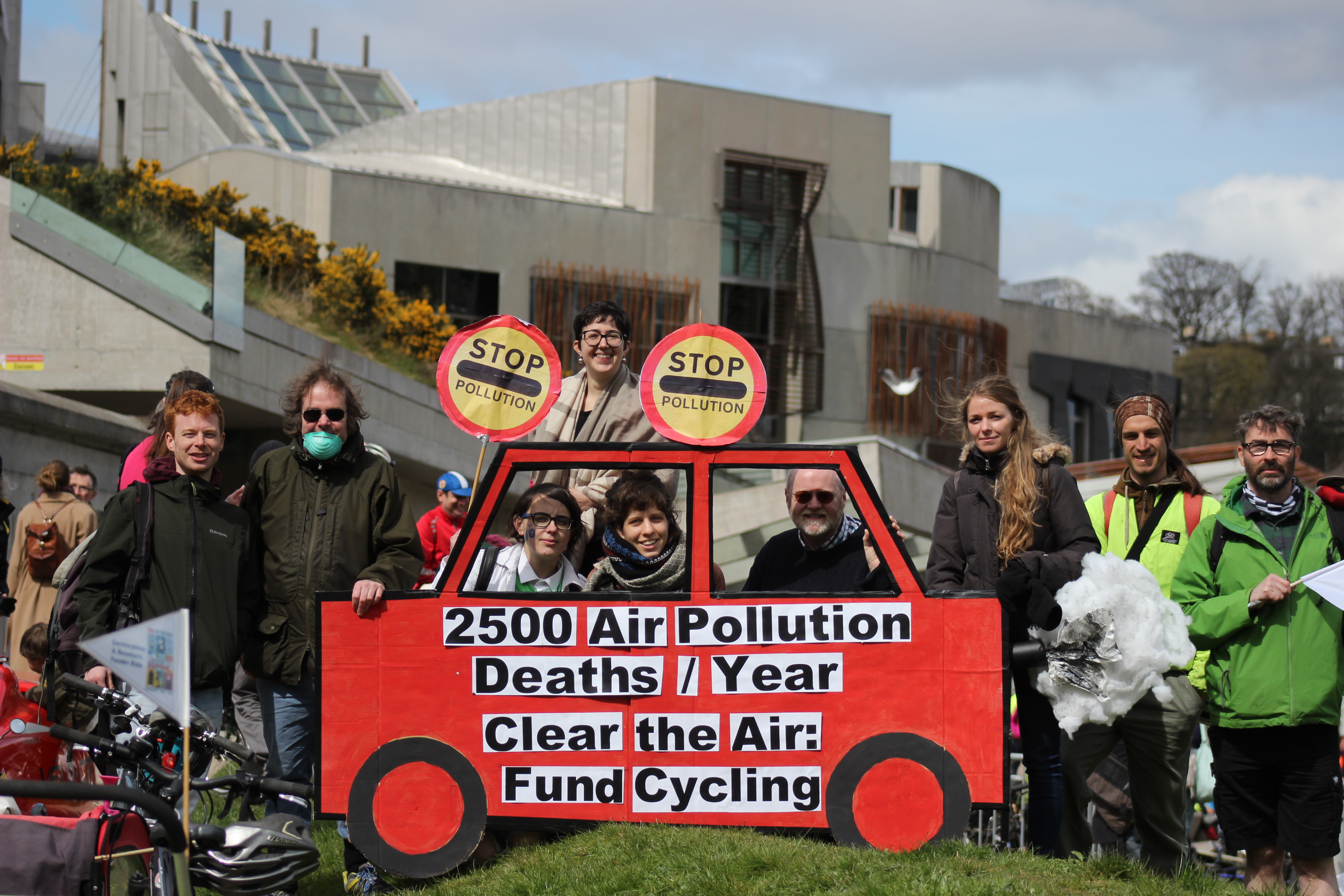 Protestors behind cardboard car calling for action on air pollution. Taken as part of Pedal on Parliament in 2016