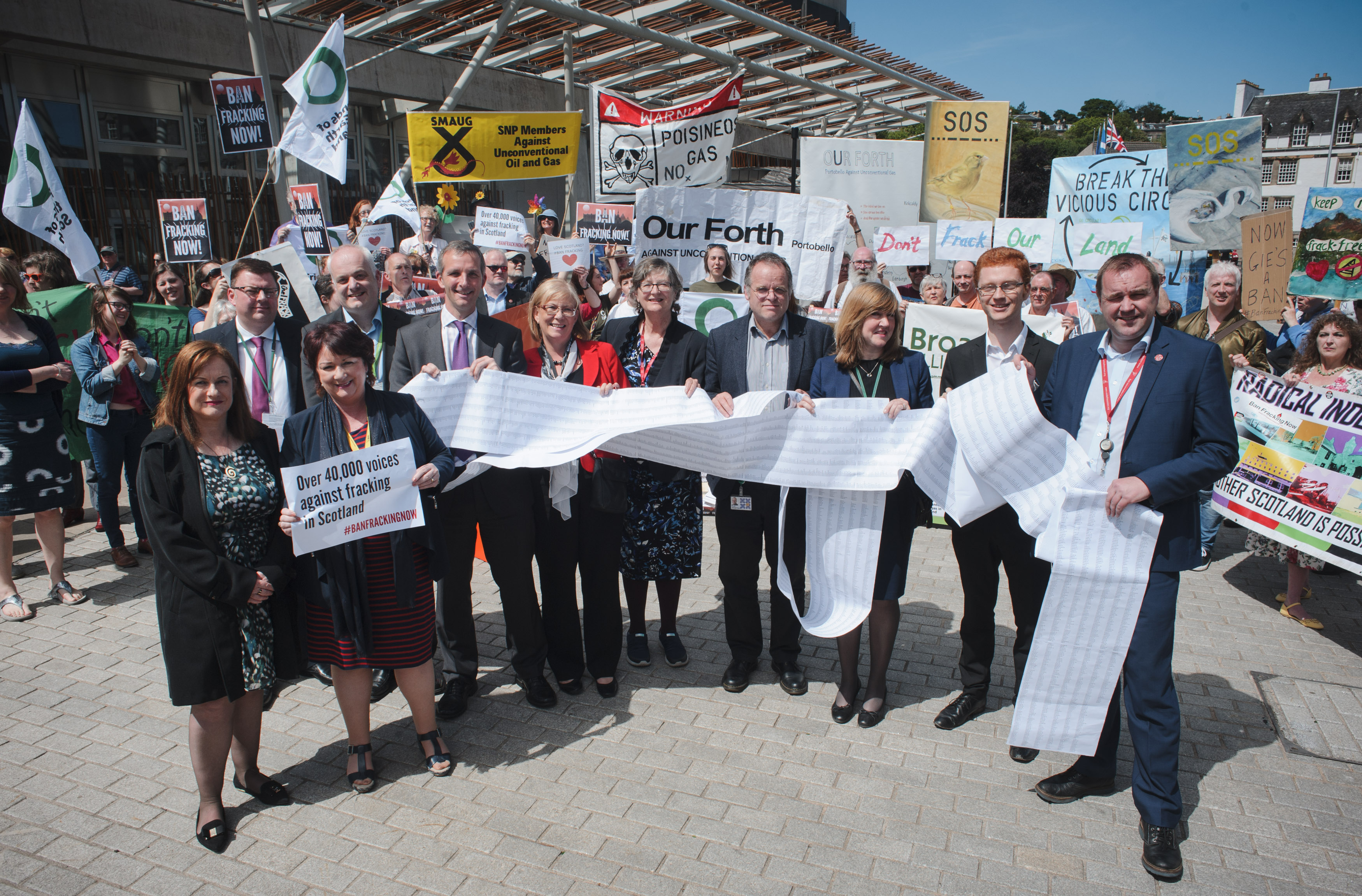 MSPs at Parliament accepting signatures calling for a ban on fracking