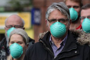 Man wearing air pollution mask, Edinburgh 2018