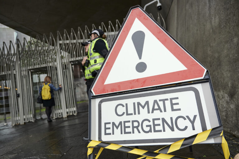 Climate Emergency road sign outside Holyrood