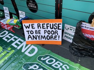 RMT strike placard reading 'we refuse to be poor anymore'