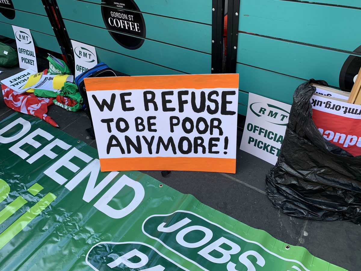 RMT strike placard reading 'we refuse to be poor anymore'