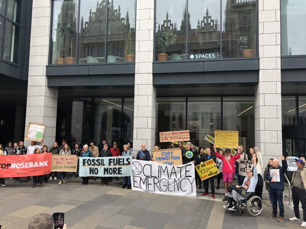 50 stop rosebank protestors stand outside building in Aberdeen