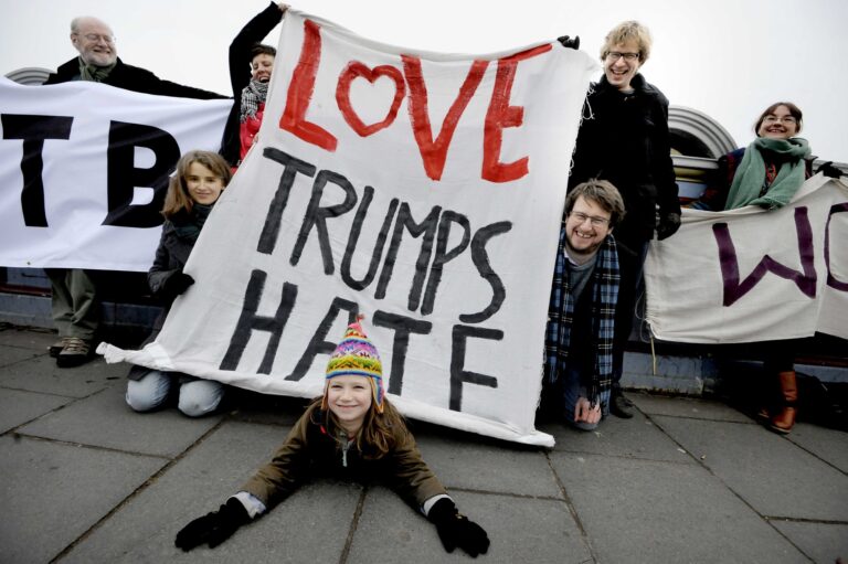 group of people with banner