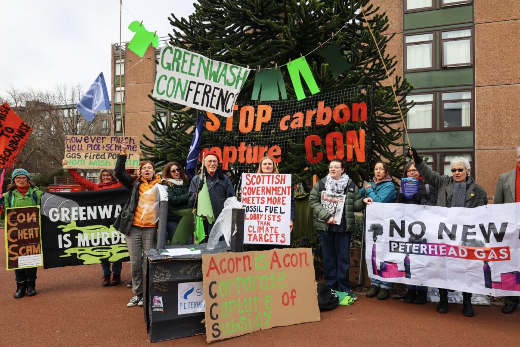 group of protestors with signs