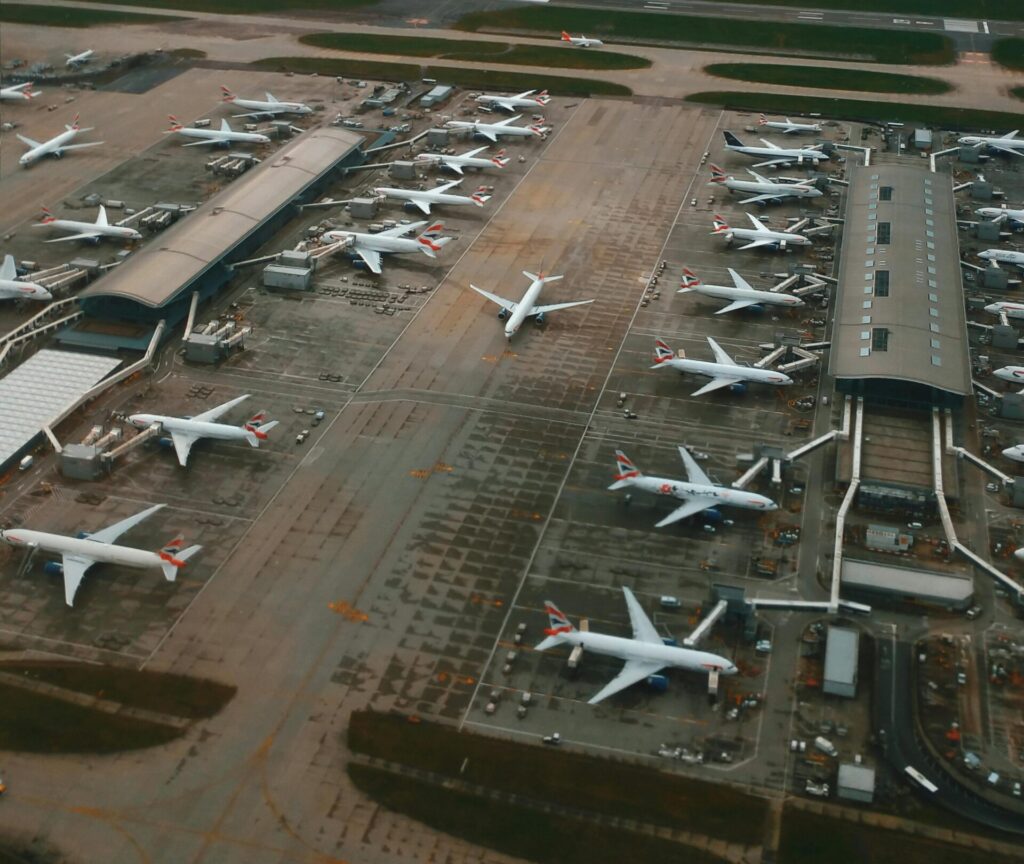 aerial photo of lots of planes parked at airport